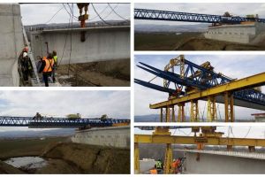 FOTO/VIDEO: Autostrada Sebeş-Turda, lotul 1 – A fost pusă prima grindă cu lansatorul de grinzi la podul peste râul Mureş