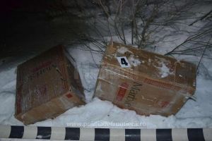 Focuri de armă trase spre pneurile unei maşini, pentru oprirea unor traficanţi de ţigări