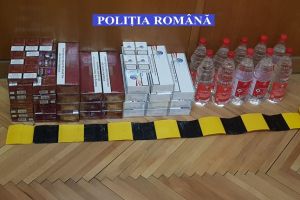 Batrana prinsa cu tigari si alcool de contrabanda in casa, in timpul unor perchezitii
