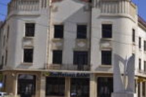 Apartamente de 800.000 de euro scoase la vânzare într-un palat din Caransebeş!