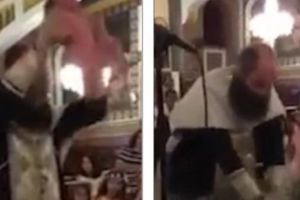 Ceremonie de botez şocantă filmată într-o biserică ortodoxă