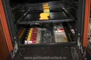 Descinderi la membrii unei retele specializate in contrabanda cu tigari