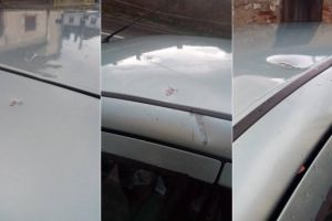 FOTO/ ȘTIREA TA: Furtuna puternică în Aiud – O maşină a fost avariată de ţiglele care au zburat de pe o casă