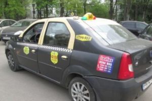 Un Logan de taxi din Ploiesti, scos la licitatie de ANAF. Cat costa masina