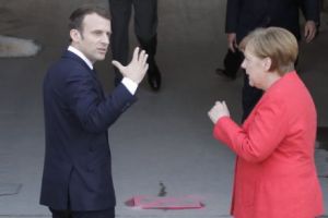 Euro-avânturile lui Merkel şi Macron se izbesc de criza imigraţiei