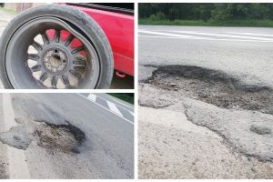 FOTO ȘTIREA TA: Atenţie, şoferi, CAPCANĂ pe şoseaua de centură a municipiului Alba Iulia! Un şofer şi-a rupt roata maşinii într-o groapă. „Voi face şi o plângere la CNAIR”