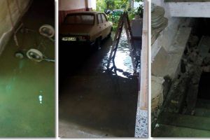 Gospodarii inundate din cauza ploii torentiale, la Faget