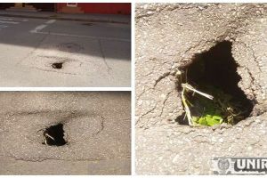 FOTO ȘTIREA TA: Groapă adâncă pe strada Vânătorilor din Alba Iulia. Asfaltul s-a surpat în apropierea unei guri de canal
