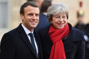 Theresa May renunţă la vacanţă pentru întâlnirea cu preşedintele Franţei! Primul ministru încearcă să îşi promoveze planul pentru Brexit