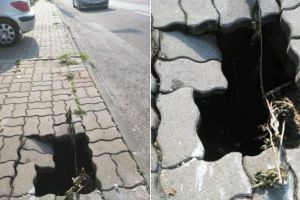 FOTO/ ȘTIREA TA: Capcană pentru pietoni, pe un trotuar din Alba Iulia – ”Dacă nu sunteţi atenţi, cădeţi într-o groapă adâncă de 2 metri!”