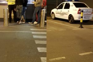 Poliţişti locali parcaţi pe loc pentru persoane cu handicap, cât timp îşi cumpără mici de la Kaufland