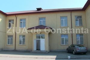 Firma controlata de fratele fostului primar din Cogealac, Ion Soare, se va ocupa de construirea unei sali de sport la Școala 2 Mai (document)