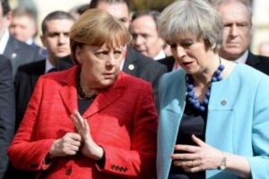 Theresa May a RUGAT-o pe Merkel să SCHIMBE Acordul de Brexit. Aceasta a REFUZAT categoric