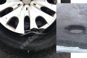 Amendă pentru constructorul Centurii. Un şofer a rupt roata într-o groapă