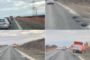 FOTO/ ȘTIREA TA: Se circulă ”bară la bară” pe DN1, la intrare în Lancrăm – ”Dorel” transformă gropile în… muşuroaie