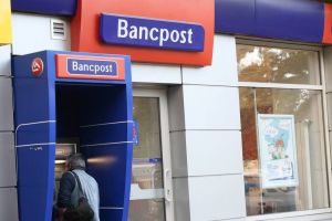 Bancpost dispare. Ce trebuie să ştie cei care au carduri sau conturi la această instituţie