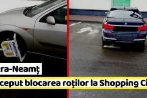 Piatra-Neamţ: A început blocarea roţilor maşinilor parcate neregulamentar la Shopping City Piatra-Neamţ (FOTO)