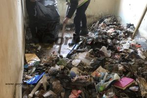 Tone de gunoaie într-un apartament din zona „Diana”
