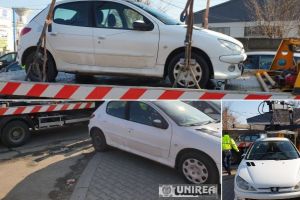 FOTO: Poliţia Locală Alba Iulia nu doarme! S-au ridicat maşini parcate pe trotuar, în zona Talciocului