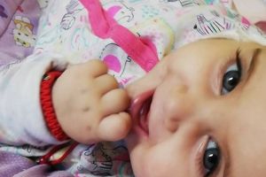 Micuţa Elisa, diagnosticată cu tumoare pe glanda suprarenală, are nevoie de ajutorul nostru!