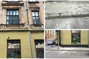 Ne pică oricând tencuiala în cap! Pericol în Piaţa Traian, au căzut bucăţi dintr-o clădire degradată