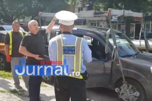 VIDEO: Scandal între un şofer şi poliţiştii locali pentru că şi-a lăsat maşina “pe interzis” 5 minute
