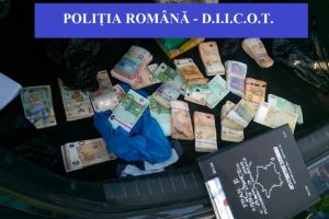 DIICOT: Grup infractional specializat in trafic de migranti si spalare de bani, destructurat de procurori