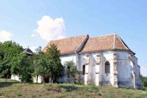 Un sat aproape părăsit din Alba, „uitat de lume” şi „la capătul pământului”, adăposteşte o biserică veche de cinci secole unde se găseşte o pictură a „împăratului roşu-galben“