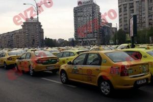 Trafic blocat în centrul Capitalei. Acţiune de protest cu sute de maşini