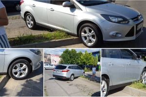 FOTO ȘTIREA TA: O şoferiţă a oferit ”parcarea” verii la Alba Iulia. Cum s-a blocat cu maşina peste o bordură