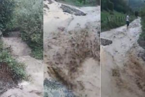 Foto/Video Știrea ta| În urma ploii puternice, o vale a ieşit din matcă şi a distrus, din nou, un drum de acces