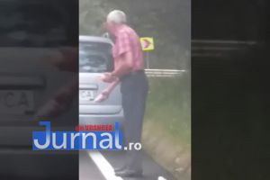 VIDEO ȘOCANT: Un vrâncean hrăneşte un urs la doi paşi de animal