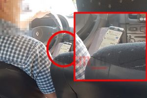 FOTO. Taximetrist surprins distrându-se pe Messenger, în timp ce conducea