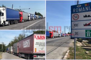 FOTO. Zeci de TIR-uri blocate în Vama Petea. Șoferii aşteaptă miezul nopţii