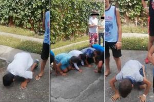 Copii obligaţi să facă mătănii pe asfalt pentru că nu sunt ascultători