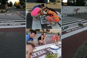 FOTO| Mesaje inscripţionate de VOLUNTARI pe trecerea de pietoni, în Alba Iulia, pentru prevenirea producerii de accidente
