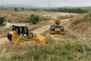 Deponeul de la Lupac se deschide în octombrie?! „Nu am văzut pe nimeni acolo. Erau două utilaje oprite şi în rest… creşte iarba”