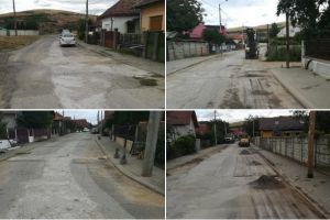 FOTO: Lucrări de asfaltare pe strada Petreşti, din cartierul albaiulian Bărăbanţ, după efectuarea lucrărilor la reţeaua de canalizare