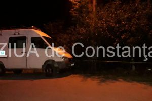 Judecatoare, gasita intr-o balta de sange, langa masina sa