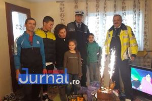 FOTO: Gestul de omenie al poliţiştilor care a făcut TOTUL pentru o familie din Coteşti