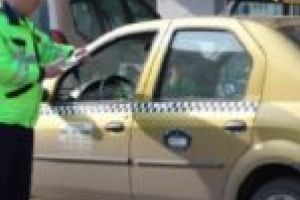 Taximetrist cu probleme! Amendat a treia oară pentru scandal cu poliţiştii
