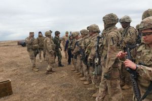 Militari ai Brigazii 9 Mecanizata Marasesti, parte a exercitiului multinational ,,JUSTICE EAGLE 20