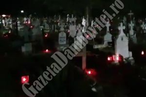 Preoţii bisericii Valea Voievozilor au aprins candele pe toate mormintele