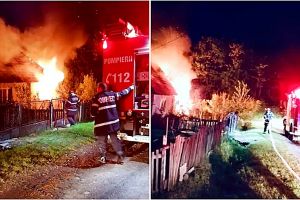 FOTO. Doi bătrâni cuprinşi într-un incendiu, salvaţi la timp! Intervenţie riscantă a pompierilor