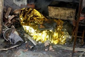 Moarte suspectă în Vâlcea. O bătrână, găsită arsă pe o grămadă de porumbi din dormitor